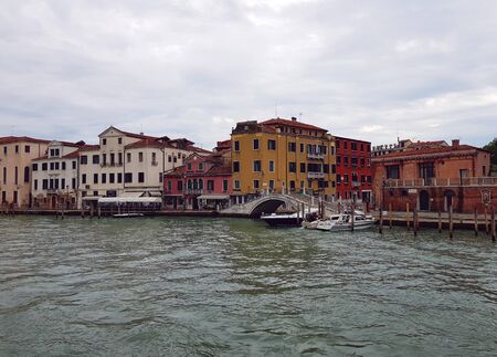 Venetian canal after the rain, ancient architecture of Italyの写真素材