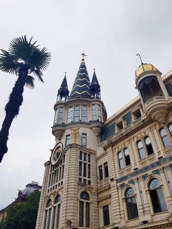 Pointed tower on an old building in the center of Batumiの写真素材