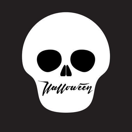 White skull on the black background with a hand drawn calligraphy Halloween in brush pen; greeting card design for holiday, halloween, flyers, posters, bannerの写真素材
