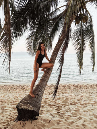 Beautiful girl on the beach sand, sea, koh samuiの写真素材