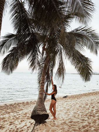 Beautiful girl on the beach sand, sea, koh samuiの写真素材