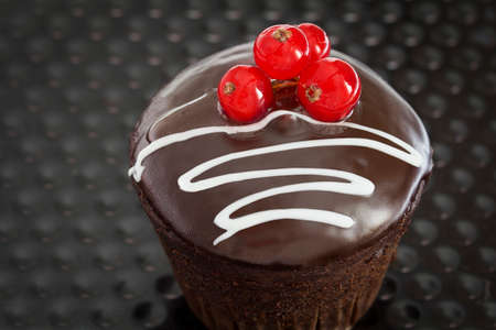 Close-up of chocolate muffins on a black backgroundの写真素材