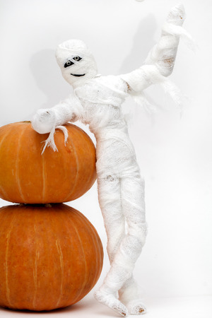 Funny zombie and pumpkins for halloweenの写真素材