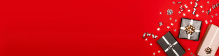Three gift boxes on red background.