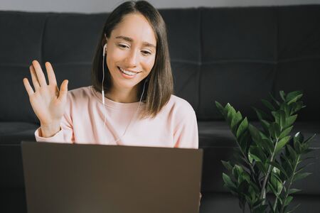 Young woman using laptop.の写真素材