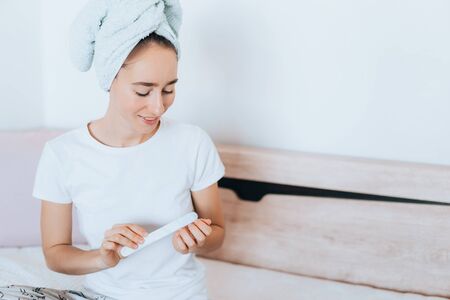 Girl makes a manicure at home.の写真素材
