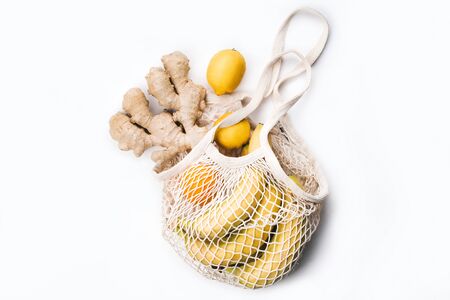 Reusable shopping bag with organic fruits and vegetables.の写真素材