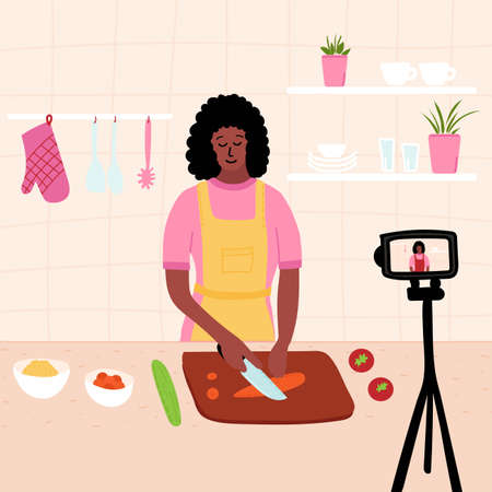 Black african chef cooking in the kitchen while recording video using her camera for her online video channel. Cook healthy food at home. homemade meals. culinary video blog or master. Vector illustration.のイラスト素材