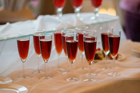 Glasses with drinks on the tableの写真素材