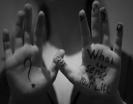 hands with words "what is the sense of your life"の写真素材