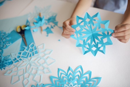 Making of snowflakes from paper.の写真素材