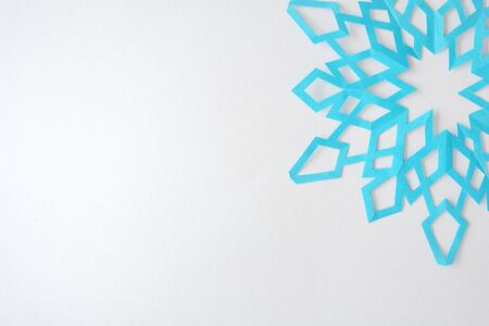 snowflakes from paper on a white backgroundの写真素材