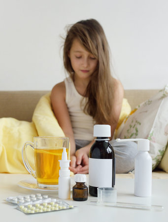 Drugs stand at a bed of the ill childの写真素材