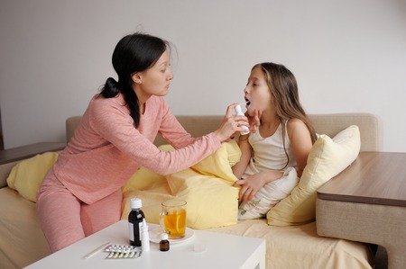 mother cares for the ill childの写真素材