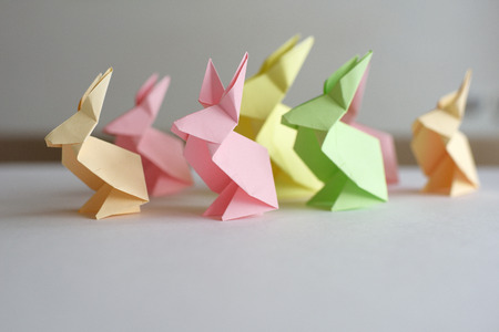 Lesson of origami. Easter rabbits from paper.の写真素材