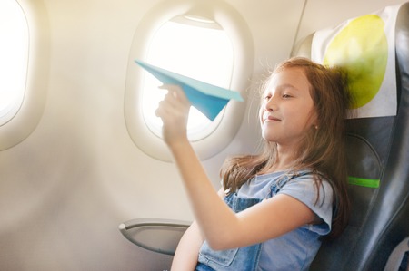 The girl sits in salon the planeの写真素材