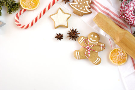 Getting ready for Christmas. Preparation of gingerbread. Top view. Hands make cookies out of dough.