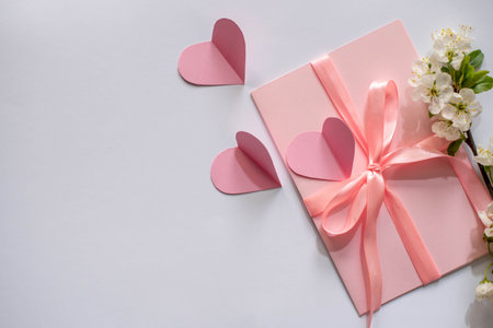 Spring bouquet of flowers on a pink background.