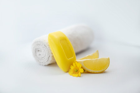 Yellow soap on a white background Lemon soap.の写真素材