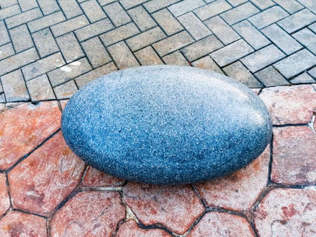 Sochi, Russia, June 20, 2020. A beautiful giant stone lies on a path in Sochi Park. Quarantine, coronavirus. No people.のeditorial素材