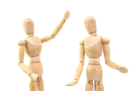 wooden human figurine depicts action and emotionsの写真素材