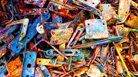 colorful yellow and blue bright background of vintage metal details for background and Wallpaper. different metal parts in the pile.の写真素材