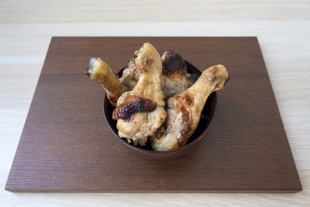 appetizing cooked chicken legsの写真素材