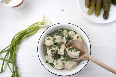 Appetizing dumplings with meat in broth.の写真素材