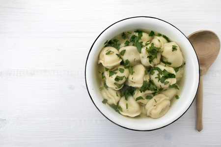 Appetizing dumplings with meat in broth.の写真素材