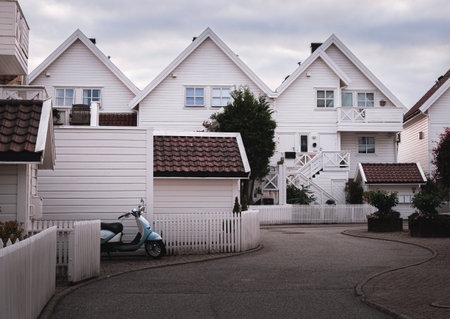 white houses and a scooter in Stavanger, Norwayの写真素材