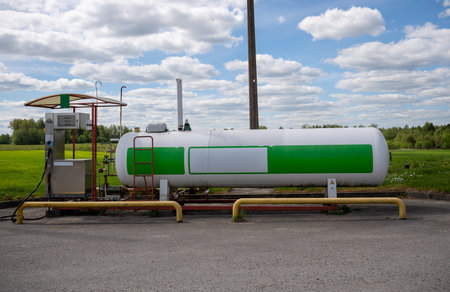 Propane gas station with large storage tank in rural countryside areaの写真素材