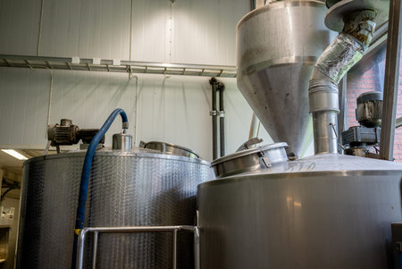 Modern stainless steel brewing equipment in craft brewery for beer production