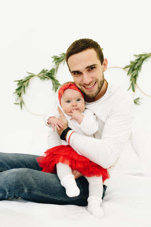New father with his newborn baby daughter, caucasian parent, fatherhoodの写真素材