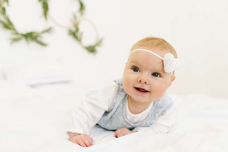 Very cute little newborn baby girl smilingの写真素材