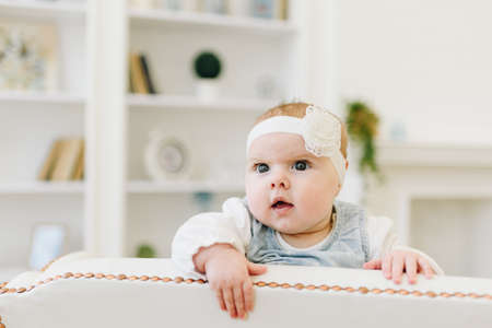 Close up of cute baby girl with flower headbandの写真素材