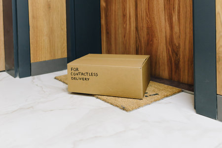 Box delivered via contactless delivery on doormat in front of front door, parcel ordered online...