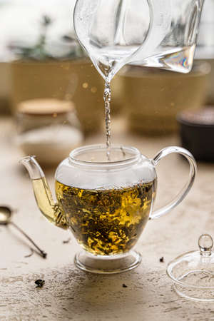 the process of brewing tea with a glass container. High quality photoの写真素材