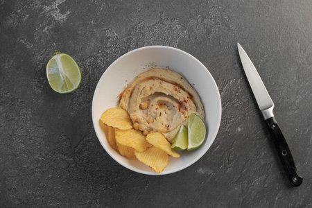 healthy snack with hummus, lime and nachos.Food flat lay. High quality photoの写真素材