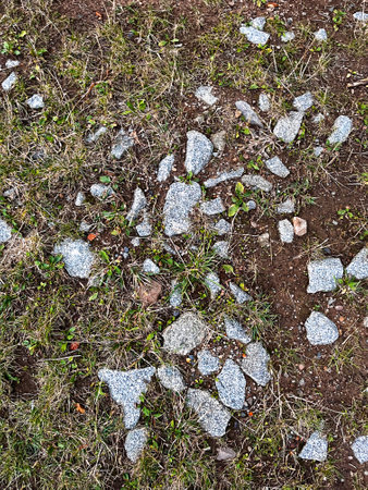 Detail of broken stones in the yard. Texture of large stone fragments.の写真素材