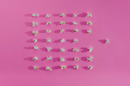 Red radish shaped like a heart on a pink background.の写真素材