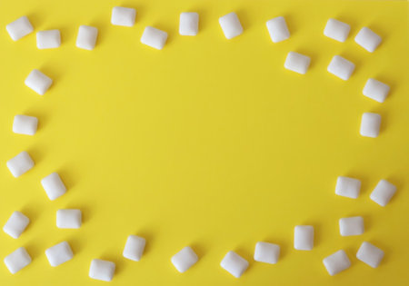 A frame of chewing gum on a yellow backgroundの写真素材