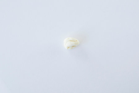 Chewed chewing gum on a white background.の写真素材