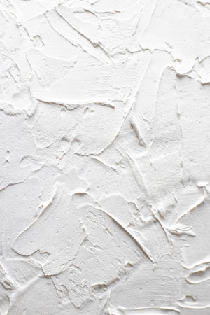 Vertical light wallpaper wall background, textured putty, plaster. Blank space for design.