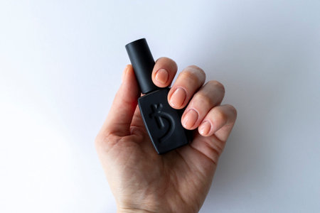 IRPEN, UKRAINE, JANUARY 20 20223, Kodi Gel Lacquer in a womans hands, Illustrative Editorial.