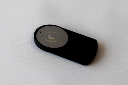Remote button for camera on white background