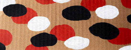 White, black and red chaotic sloppy circles on cardboard. Abstract background, stylish design. Banner formatの写真素材