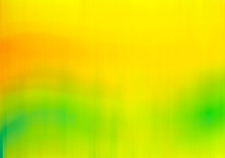Bright yellow background with green and orange gradient wavy spotsの写真素材