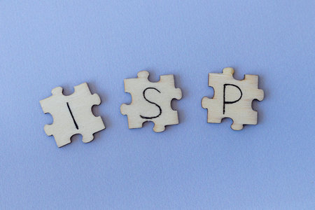 The acronym ISP, which stands for Internet Service Provider. The letters written on the puzzles.の写真素材