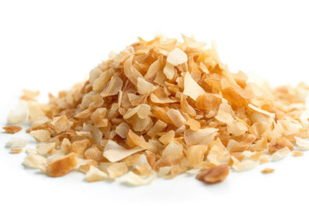 Pile of chopped almond flakes isolated on white background. close up.の素材