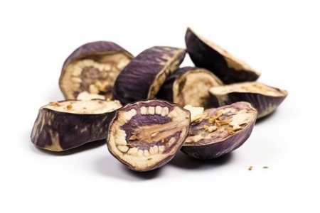 Slices of dried purple eggplant isolated on white background.の素材